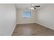Bedroom featuring a ceiling fan and laminate floors at 340 Autumn Palace Ct, Las Vegas, NV 89144
