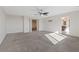 Spacious bedroom features a ceiling fan and access to the bathroom and upstairs loft at 340 Autumn Palace Ct, Las Vegas, NV 89144