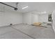Spacious, unfinished garage with concrete floors and ample storage at 340 Autumn Palace Ct, Las Vegas, NV 89144