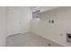 Well-lit laundry room with tiled flooring, shelving and utility connections at 340 Autumn Palace Ct, Las Vegas, NV 89144