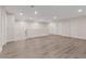 Upstairs loft area featuring wood floors, white railing, and recessed lighting at 340 Autumn Palace Ct, Las Vegas, NV 89144