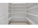 Walk-in pantry with plenty of shelving for optimal storage at 340 Autumn Palace Ct, Las Vegas, NV 89144