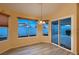 Bright dining area with wood-look floors, sliding glass doors, and recessed lighting at 3426 Side Saddle Ct, North Las Vegas, NV 89032