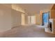 Open-concept living room with high ceilings, neutral carpet, and ample natural light at 3426 Side Saddle Ct, North Las Vegas, NV 89032