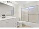 Bathroom featuring a modern vanity, a sleek mirror, and a shower with sliding glass doors at 3455 Erva St # 112, Las Vegas, NV 89117