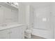 Clean bathroom featuring a tub shower, toilet and single sink vanity at 3455 Erva St # 112, Las Vegas, NV 89117
