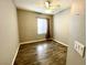 Cozy bedroom with wood-look floors and natural light, offering a comfortable retreat at 3809 Van Ness Ave, North Las Vegas, NV 89081