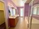 Spacious main bathroom features double sinks, soaking tub, and separate shower at 3809 Van Ness Ave, North Las Vegas, NV 89081