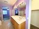 Elegant main bathroom with double sinks, vanity, walk-in shower, and connected to bedroom at 3809 Van Ness Ave, North Las Vegas, NV 89081