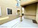 Side yard walkthrough with gated access and desert-friendly landscaping at 3809 Van Ness Ave, North Las Vegas, NV 89081