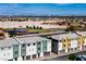 Expansive view of the city and valley from above modern townhomes and the community ballfields at 3880 Enchanted Sky St, Las Vegas, NV 89129