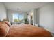 Spacious bedroom filled with natural light, neutral walls, and carpet offering a serene and inviting atmosphere at 3880 Enchanted Sky St, Las Vegas, NV 89129