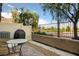Outdoor patio area with a small table and chairs, great for relaxing and enjoying the view at 3880 Enchanted Sky St, Las Vegas, NV 89129