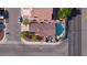 Aerial shot of a home with a private pool and spa, set on a well-maintained neighborhood street at 3913 Lilac Haze St, Las Vegas, NV 89147