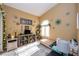 Bright bedroom with a vaulted ceiling, large window, and neutral decor, offering a tranquil and peaceful retreat at 3913 Lilac Haze St, Las Vegas, NV 89147