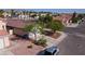 Inviting single-story home with desert landscaping, mature trees, and easy access to neighborhood streets at 3913 Lilac Haze St, Las Vegas, NV 89147