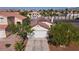 Charming single-Gathering home showcasing a clean two-car garage and a well-manicured front yard at 3913 Lilac Haze St, Las Vegas, NV 89147