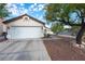 Charming single story home with a two-car garage and desert landscaping at 3913 Lilac Haze St, Las Vegas, NV 89147