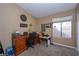 Cozy office space with desk, chair, and natural light from the window at 3913 Lilac Haze St, Las Vegas, NV 89147