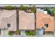 Aerial view of residential homes with well-maintained lawns and tile roofs at 404 Via Sonador, Henderson, NV 89012