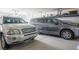 Organized garage with shelving, room for two cars, and ample storage at 404 Via Sonador, Henderson, NV 89012