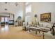 Spacious living room with high ceilings, hardwood floors, and elegant furnishings at 404 Via Sonador, Henderson, NV 89012