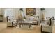 Bright and airy living room featuring stylish furniture, glass tables, and decorative accents at 404 Via Sonador, Henderson, NV 89012