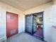 Secured entrance with locked gate and storm door at 4151 Sanderling Cir # 351, Las Vegas, NV 89103