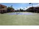 Well-maintained community tennis court available for residents to use in a sunny setting at 4151 Sanderling Cir # 351, Las Vegas, NV 89103