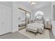 Bedroom with a full size closet, white walls, light vinyl flooring and shutter shades at 4418 Desert Bloom Ct, Las Vegas, NV 89129