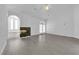Open primary bedroom with ensuite fireplace and bath, bright natural light and spacious flooring at 4418 Desert Bloom Ct, Las Vegas, NV 89129