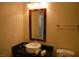 This bathroom features a modern sink, a mirror, and a towel rack at 4585 Dean Martin Dr # 205, Las Vegas, NV 89103