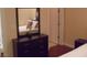Bedroom featuring a dresser and mirror with a view of the bed at 4585 Dean Martin Dr # 205, Las Vegas, NV 89103
