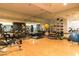 A modern gym with hardwood floors has an array of exercise equipment at 4585 Dean Martin Dr # 205, Las Vegas, NV 89103