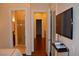 Hallway featuring wood floors and a partial view of the bathroom and bedroom at 4585 Dean Martin Dr # 205, Las Vegas, NV 89103