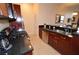 The kitchen features modern stainless steel appliances, wooden cabinetry, and granite countertops at 4585 Dean Martin Dr # 205, Las Vegas, NV 89103