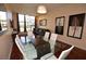 This open-concept living room features hardwood floors, plenty of natural light and modern decor at 4585 Dean Martin Dr # 205, Las Vegas, NV 89103