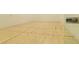 View of racquetball court showcasing its wooden floor, wall, and door at 4585 Dean Martin Dr # 205, Las Vegas, NV 89103