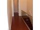 Stairs featuring wood steps, and a glass railing at 4585 Dean Martin Dr # 205, Las Vegas, NV 89103
