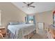 Comfortable bedroom with neutral walls, vaulted ceilings, carpet flooring, and natural lighting at 4628 Standing Bluff Way, Las Vegas, NV 89130