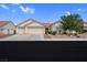 Charming single-story home featuring a two-car garage, desert landscaping, and a classic Southwestern style at 4628 Standing Bluff Way, Las Vegas, NV 89130