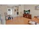 Comfortable living area with hardwood floors and views to an adjacent room, promoting an open feel at 4628 Standing Bluff Way, Las Vegas, NV 89130