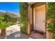 Inviting front entrance with stone pavers and lush landscaping at 4719 Riva De Romanza St, Las Vegas, NV 89135