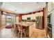 Gourmet kitchen with granite counters, a central island, and stainless steel appliances at 4719 Riva De Romanza St, Las Vegas, NV 89135