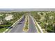 Wide, manicured street lined with palm trees creates an inviting approach to a neighborhood with mountain views at 4719 Riva De Romanza St, Las Vegas, NV 89135