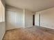 Bright bedroom features neutral walls, carpet flooring and closet with panel doors at 4943 Indian River Dr # 133, Las Vegas, NV 89103