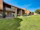 Beautiful apartment homes with lush landscaping and green lawns at 4943 Indian River Dr # 133, Las Vegas, NV 89103