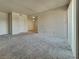 Open living room design with carpet flooring, and neutral paint at 4943 Indian River Dr # 133, Las Vegas, NV 89103