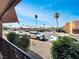 Parking and landscaped common areas feature mature trees and clear blue sky at 4943 Indian River Dr # 133, Las Vegas, NV 89103