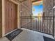 Cozy patio view with a secured railing and a glimpse of the community landscape at 4943 Indian River Dr # 133, Las Vegas, NV 89103